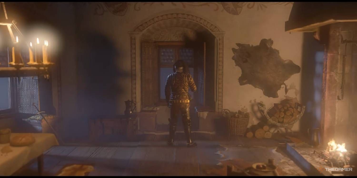 Istvan Toth looking out his window before duelling Henry in Kingdom Come Deliverance 2.