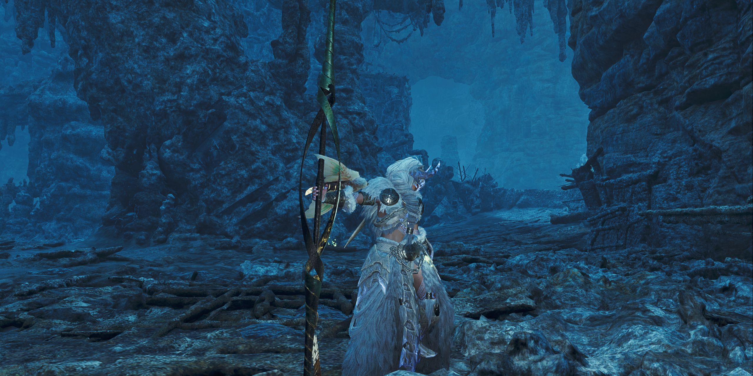 The Hunter posing with an Artian Insect Glaive in Monster Hunter Wilds.