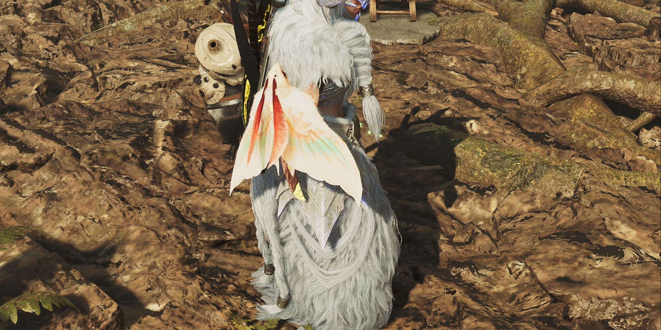 A kinsect resting on a Hunter's arm in Monster Hunter Wilds.
