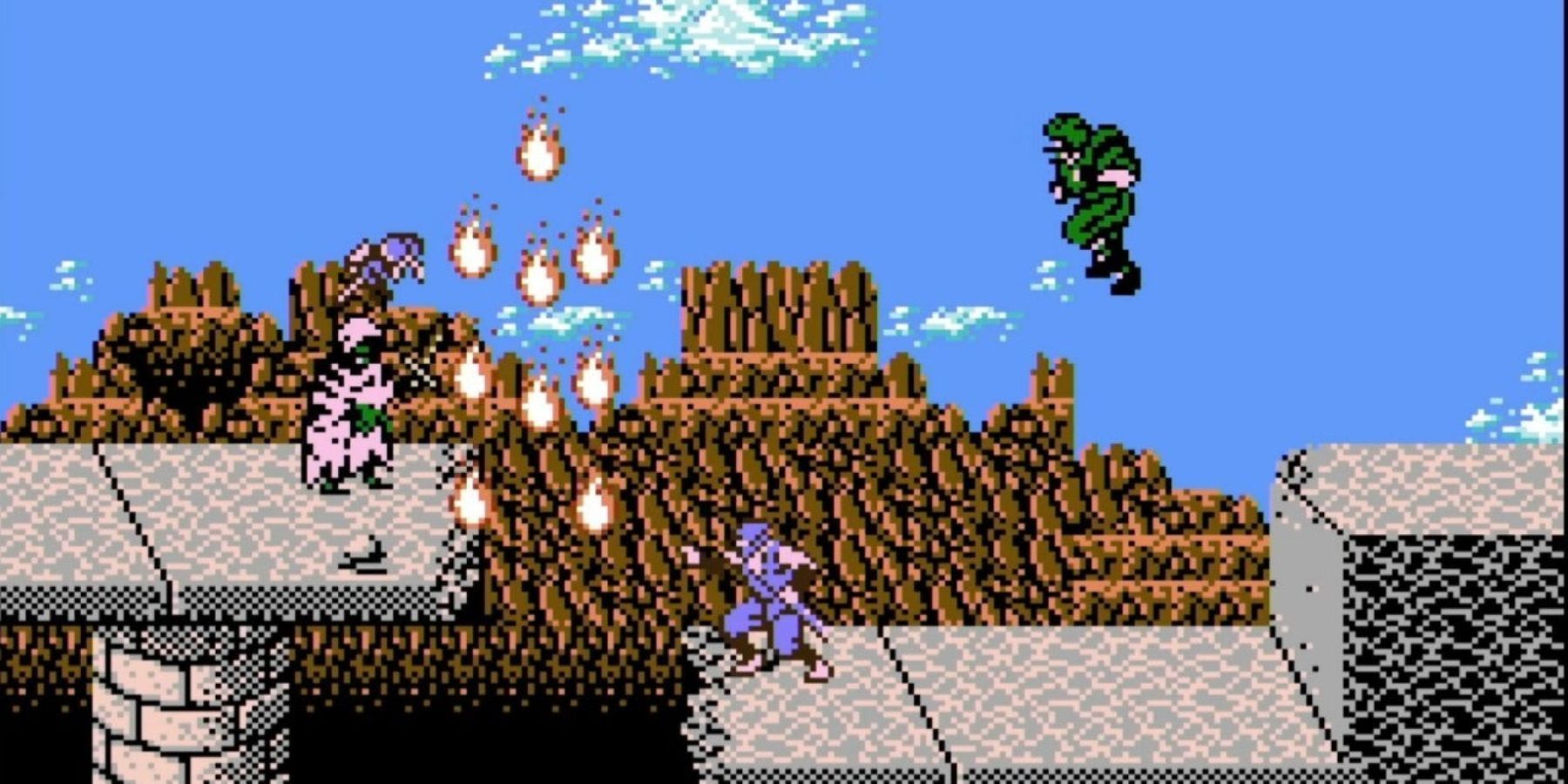 Ryu Hayabusa pelting an enemy with his Ninpo power in Ninja Gaiden 1989