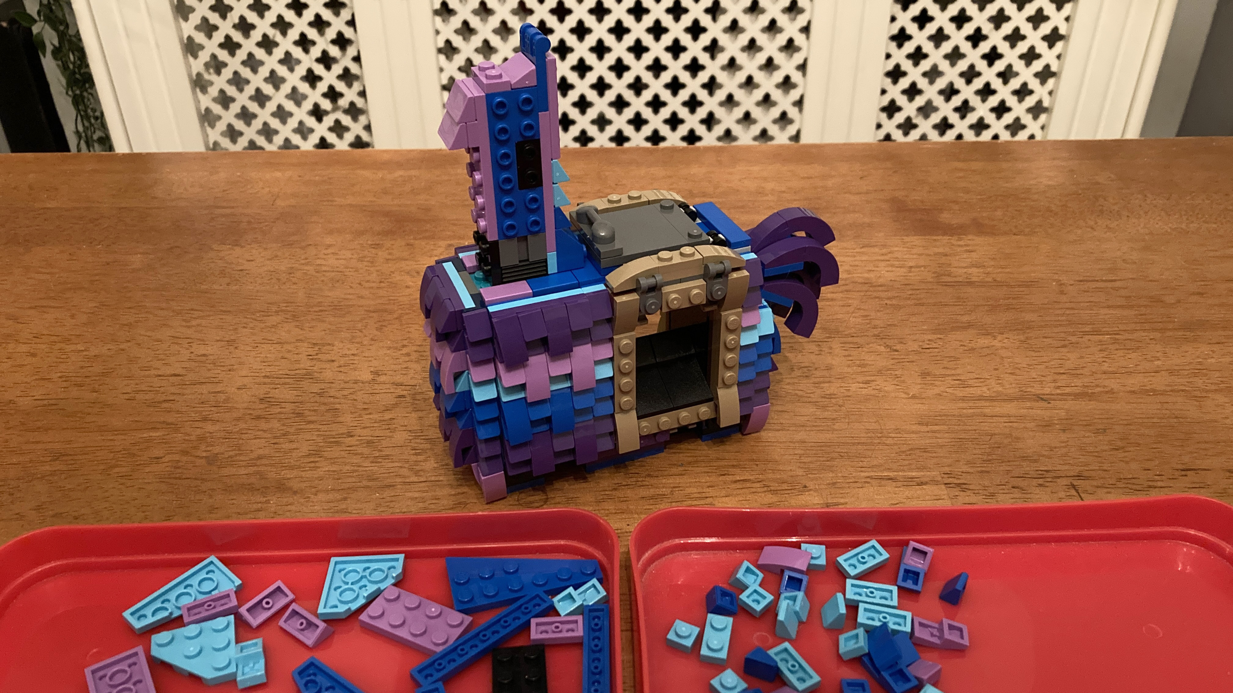 A partly constructed Lego Fortnite Supply Llama (77071)