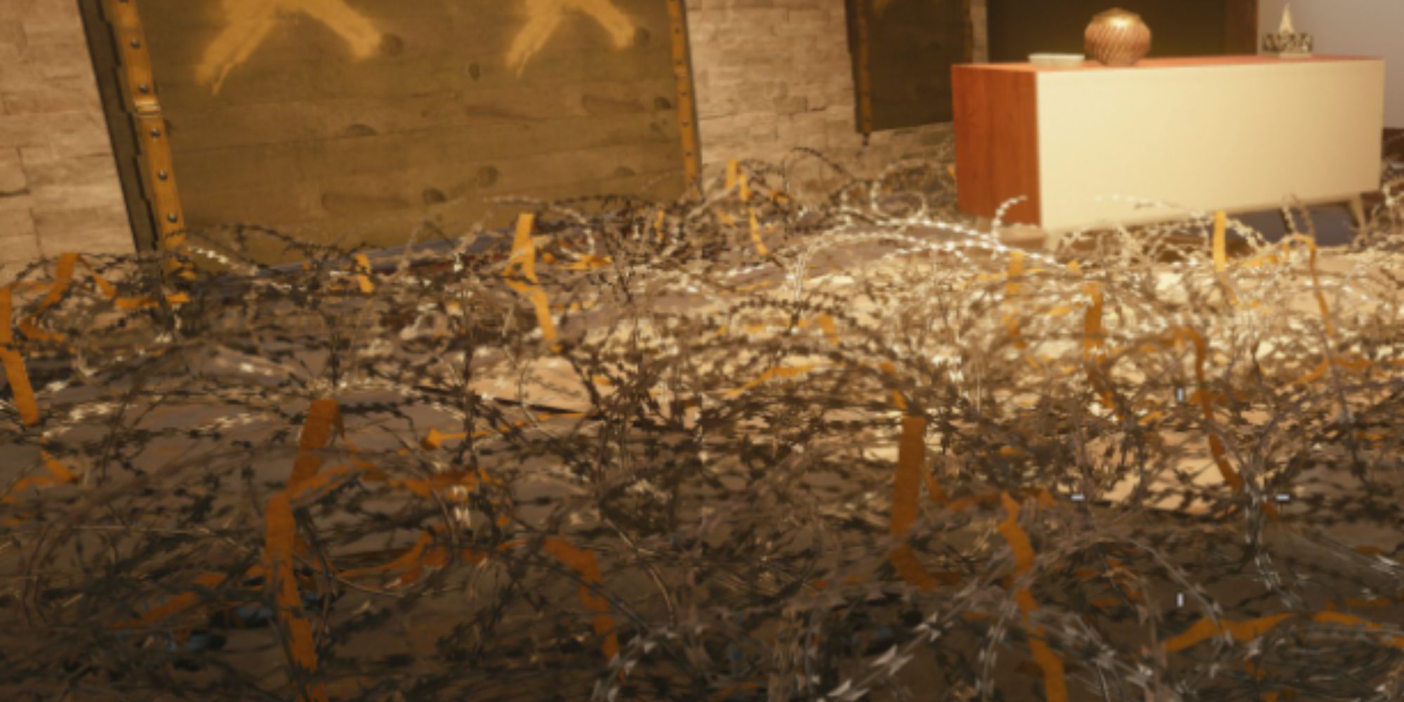 A lot of barbed wire laying on the floor by a door in Rainbow Six Siege.