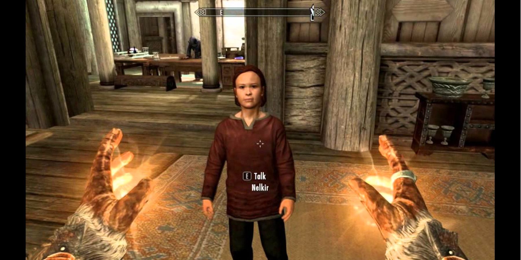 Nelkir the Child talks to the player in Skyrim.