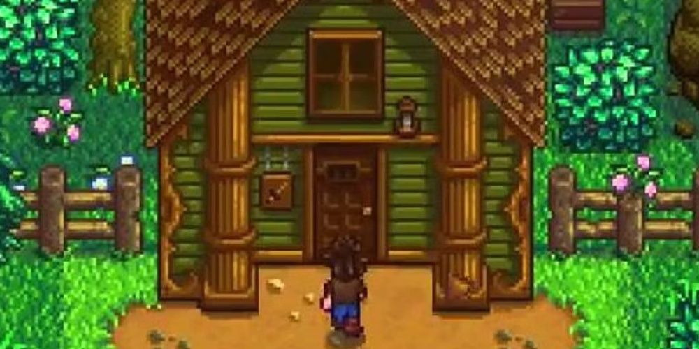 A player approaching the Adventurers Guild in Stardew Valley the video game