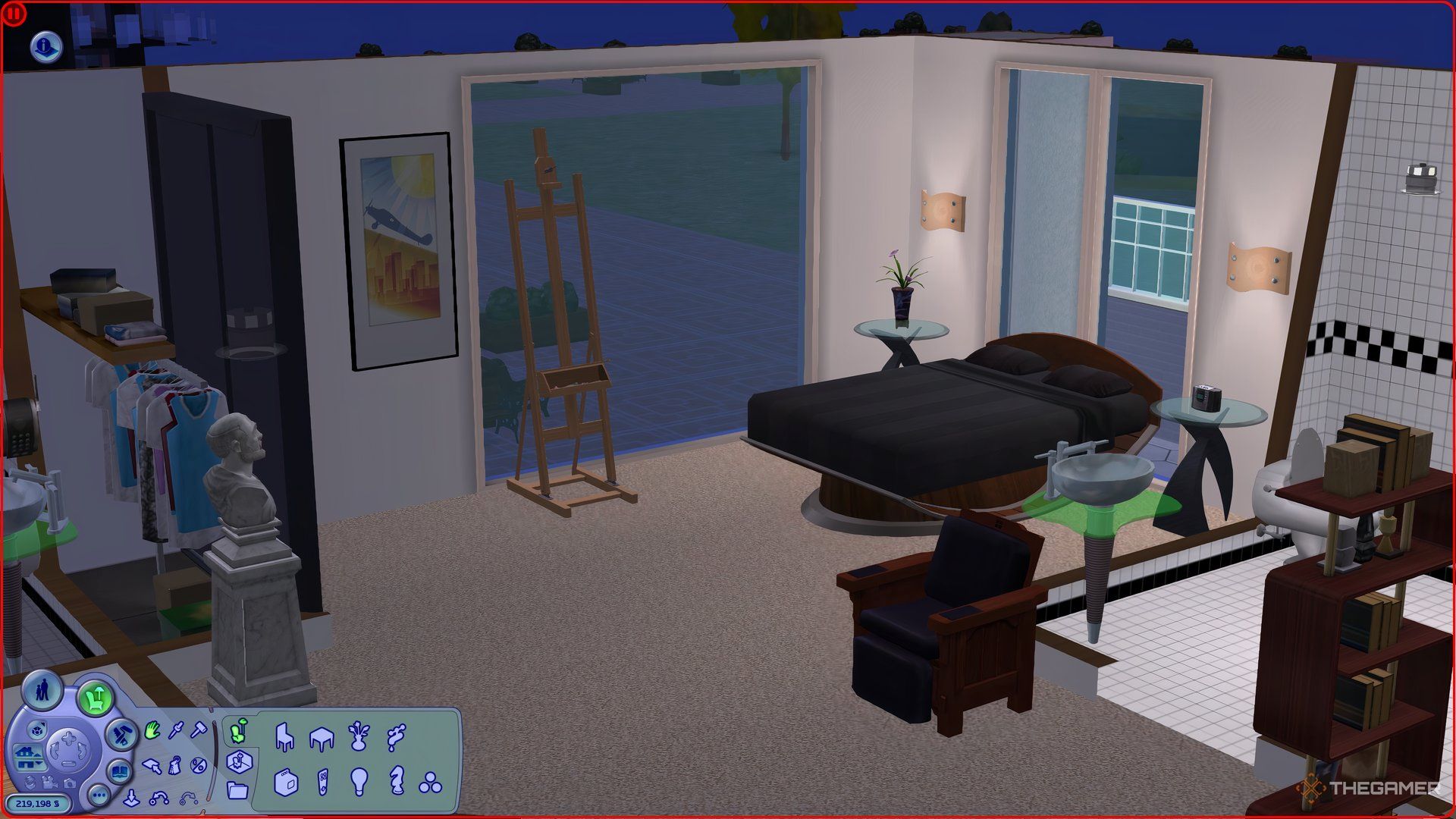 An expensive apartment in The Sims 2 buy mode, showing a bed, art, lounger, etc.