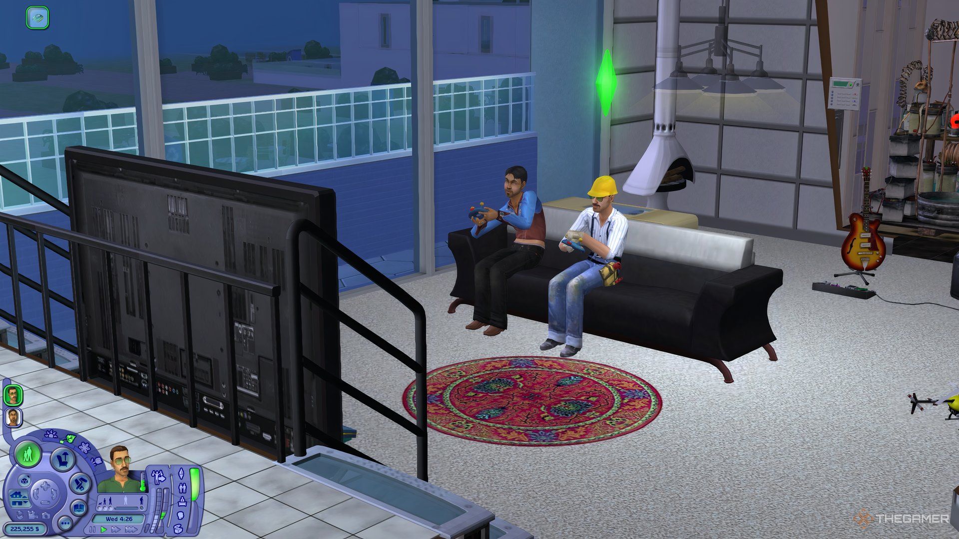 Two husband Sims in The Sims 2 playing video games together in their apartment.