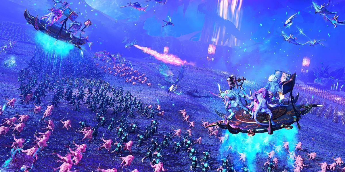 The demonic hordes of Chaos marshal on the battlefield in Total War Warhammer 3, bathed in blue light.