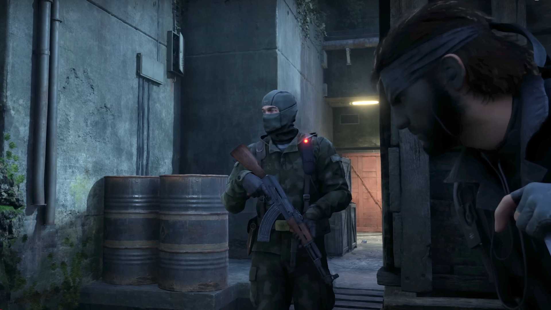 A screenshot of Snake hiding from a guard during the trailer for Metal Gear Solid Delta.