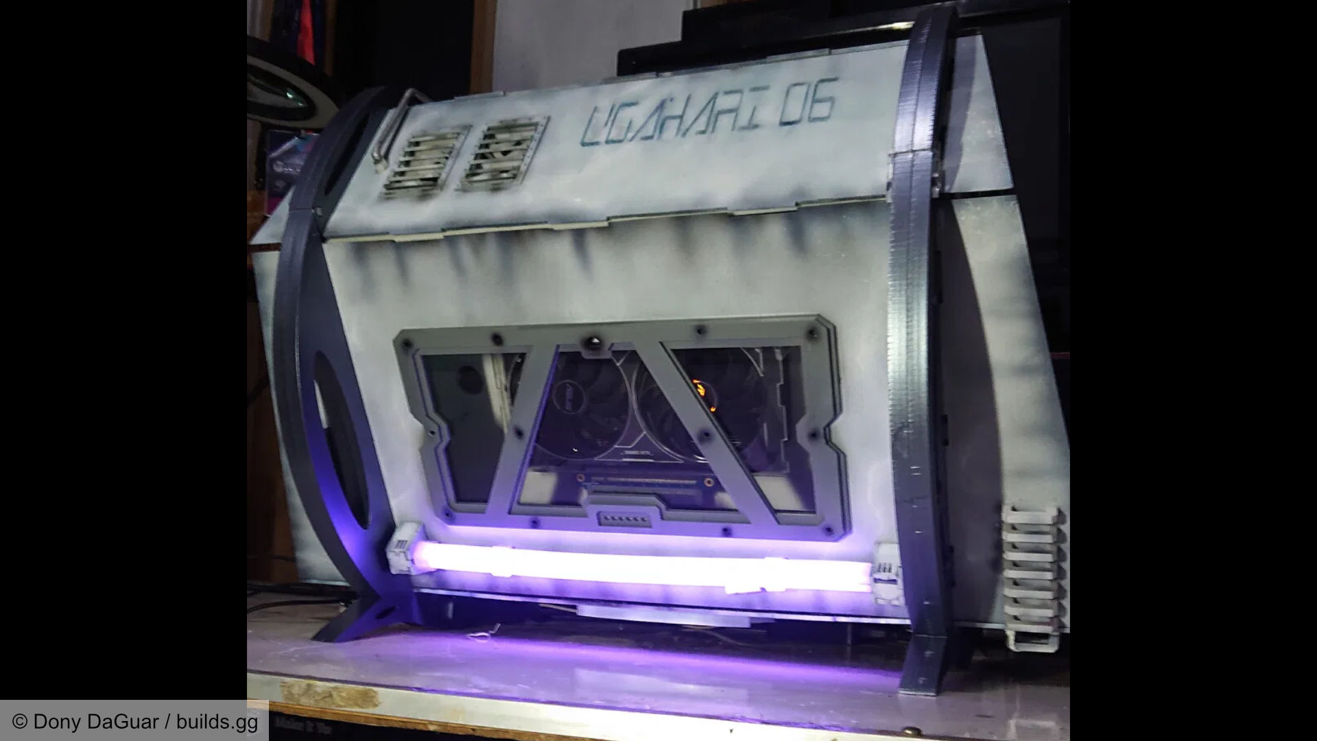 Futuristic space-like gaming PC build, side view with RGB