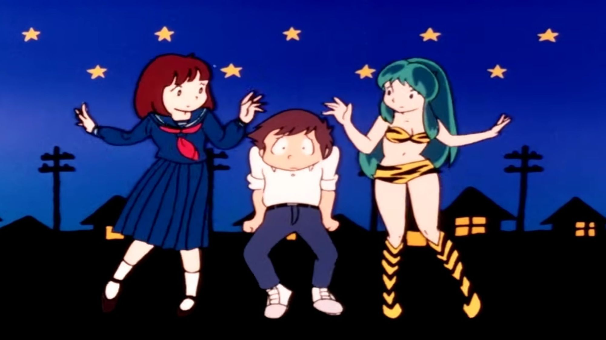 Ataru dances between Princess Lum and his girlfriend Shinobu. 