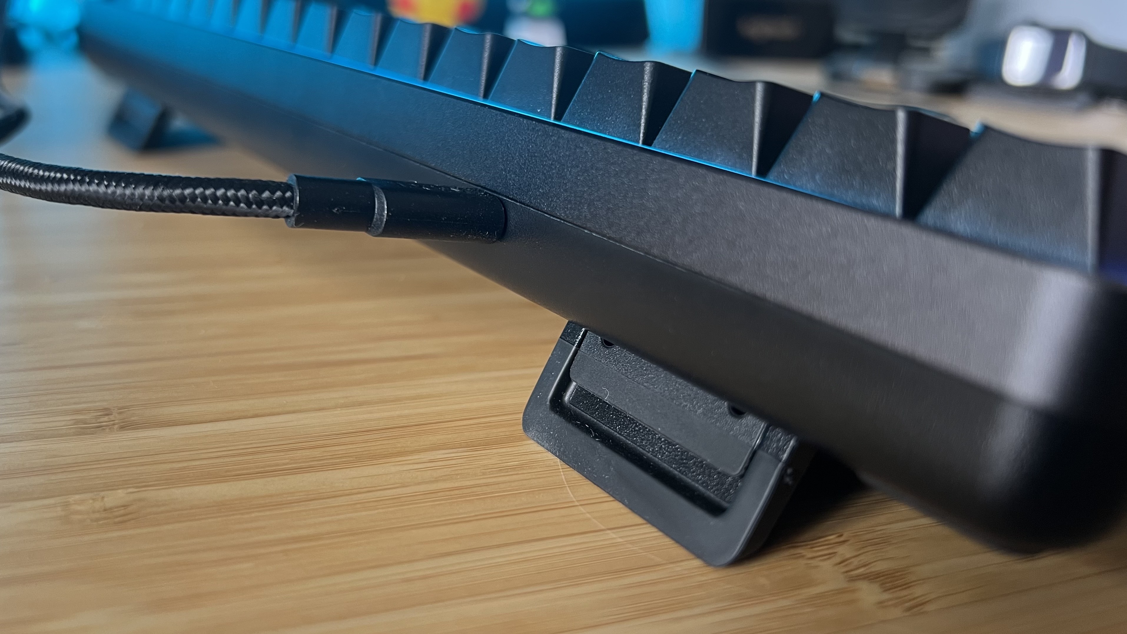 Close up on NZXT Function Elite MiniTKL USB-C connection with cable attached