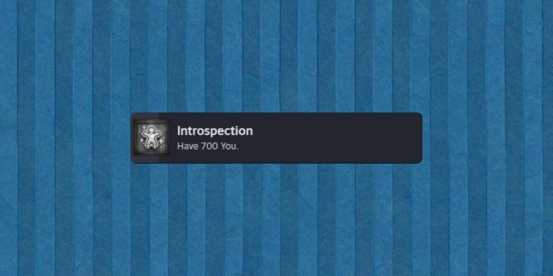 A blue background is shown, with the steam achievement 'Introspection' shown.