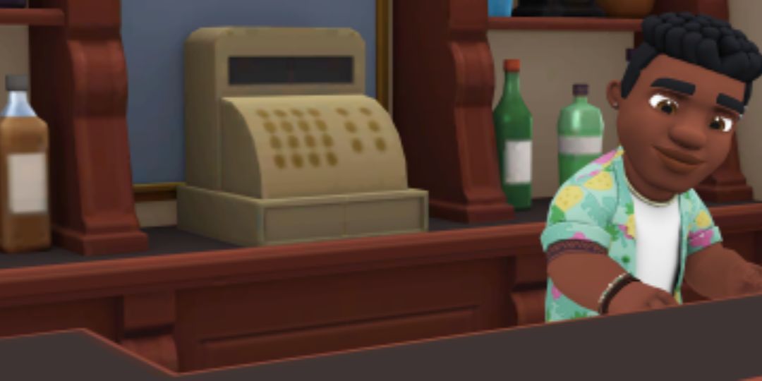Damon Mthembu-Haas works at his bar. He is a young man in a Hawaiian shirt.