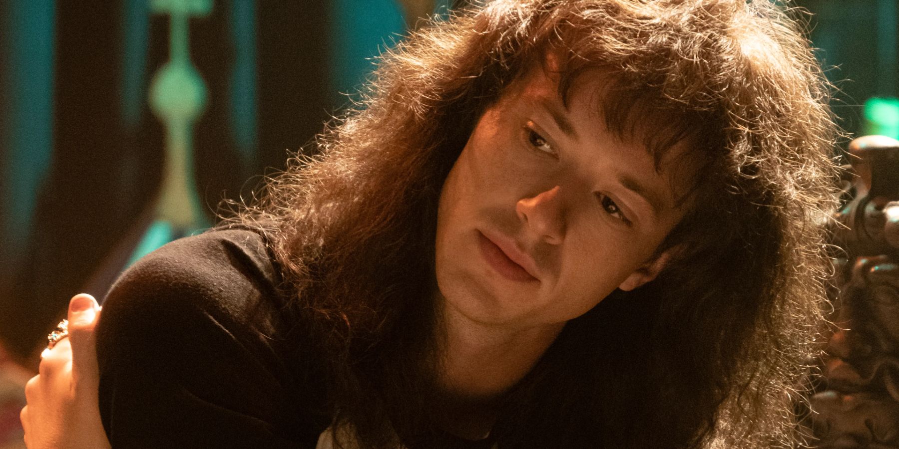 Close up shot of Eddie Munson from Stranger Things
