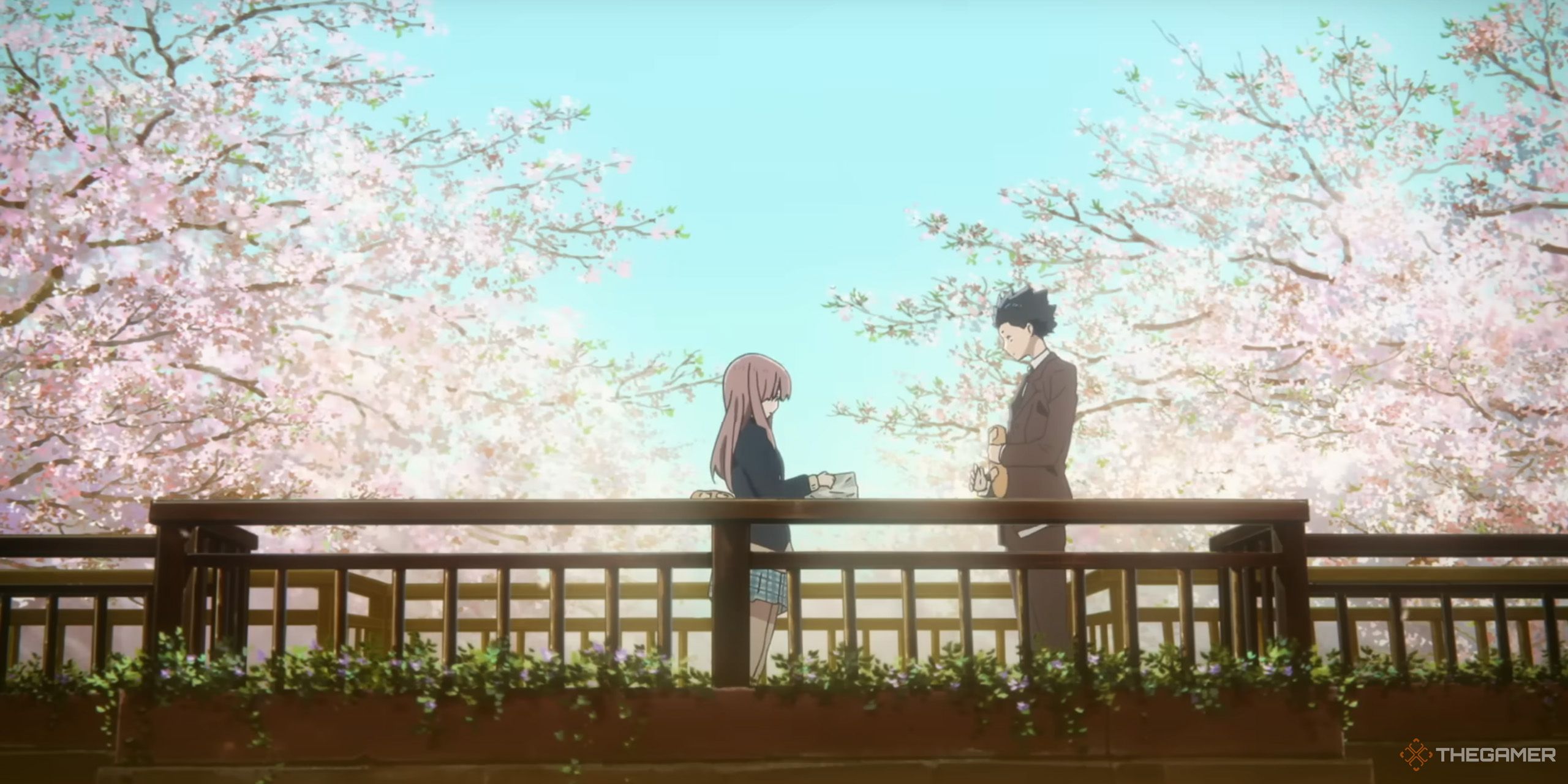 Shouya Ishida and Shouko Nishimiya standing on a bridge in A Silent Voice.