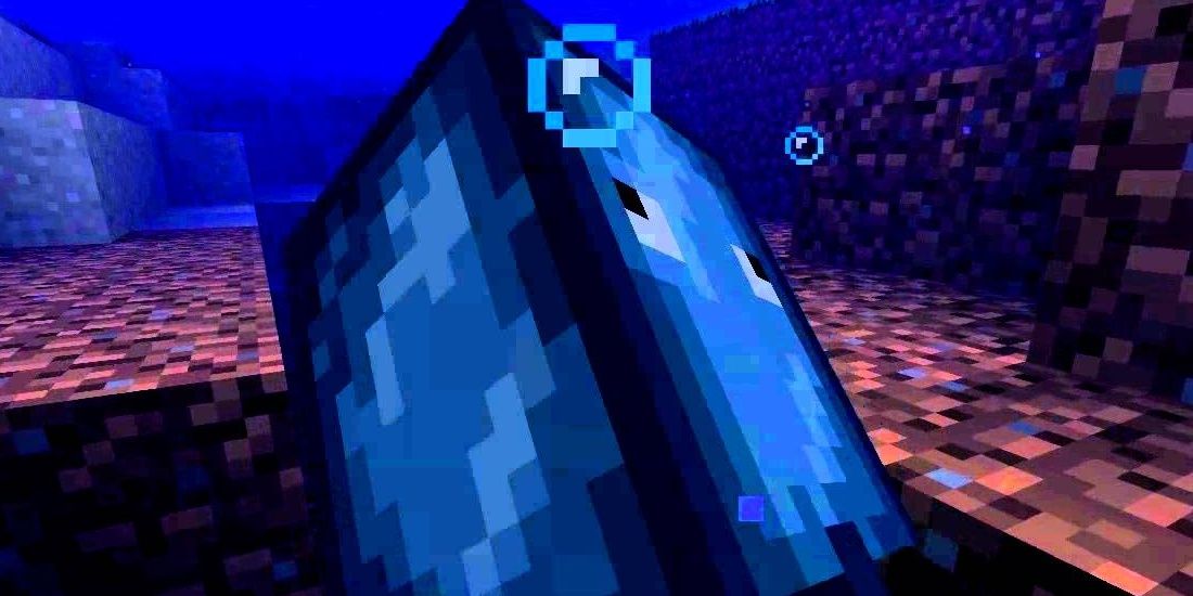 Image of a squid with bubbles around it underwater from Minecraft.