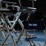 Paul Rudd's small chair alongside other full-sized chairs