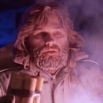 Kurt Russell in The Thing holding a stick of dynamite.