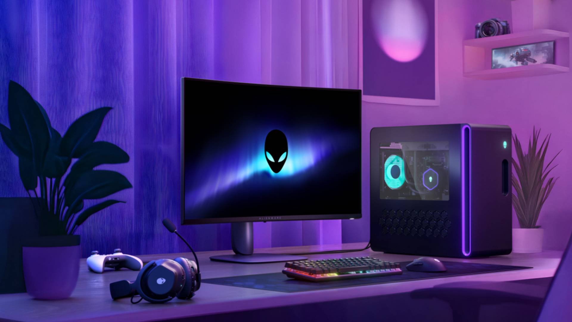 Alienware AW3225DM monitor on desk next to Aurora R16 PC, keyboard, mouse, headset, and plants