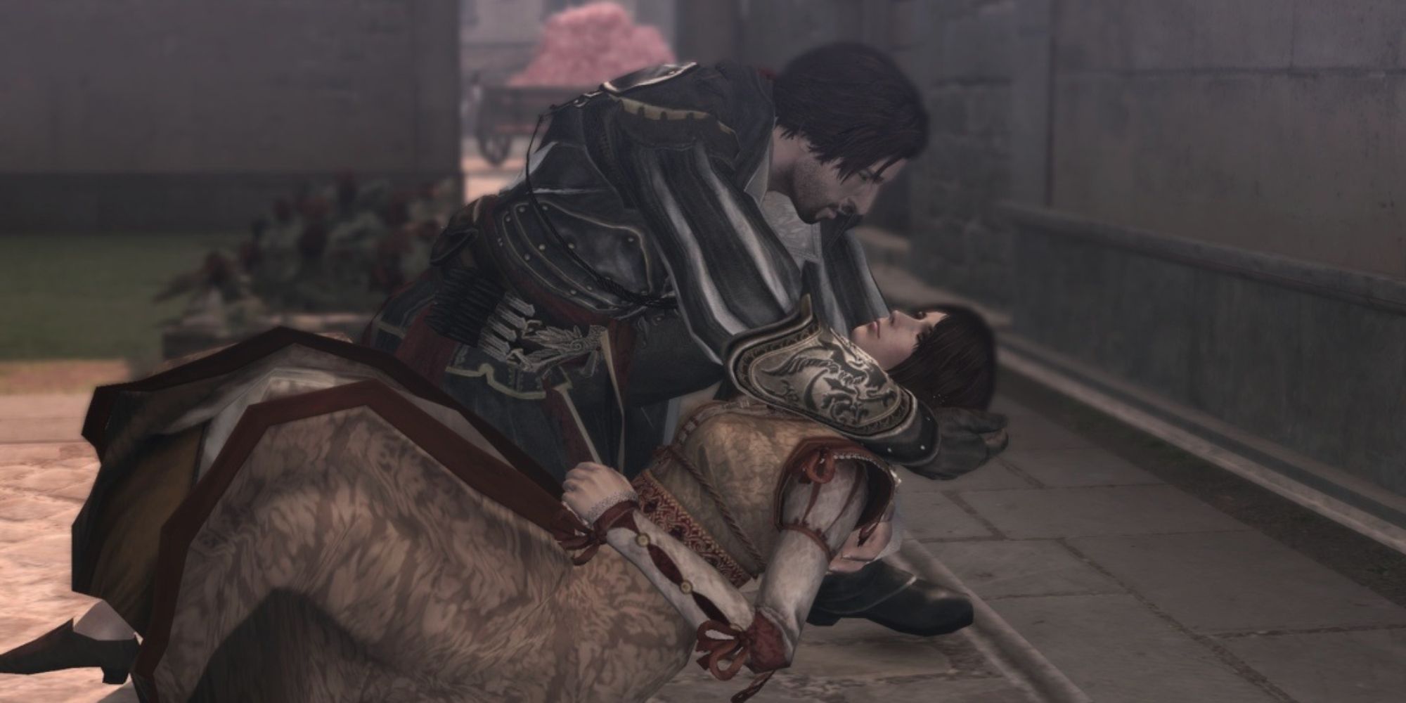 Assassin's Creed Brotherhood screenshot of Ezio holding Cristina during her death.