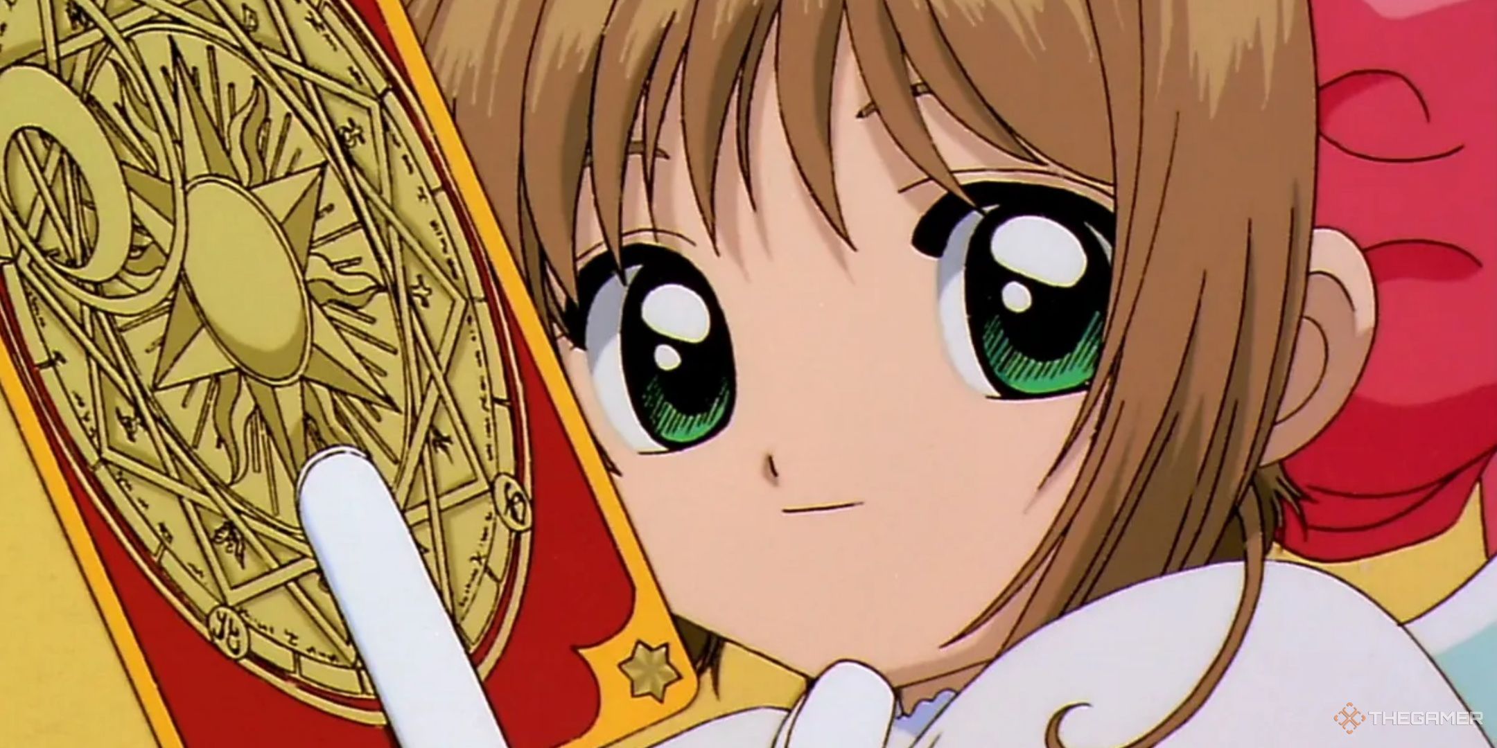 Cardcaptor Sakura is holding up a Clow Card.