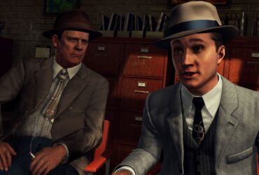 Two characters pointing at the camera in LA Noire