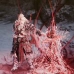 Khazan holding a red glowing sword during the upcoming PS5 game, The First Berserker: Khazan.