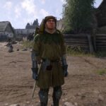 Kingdom Come: Deliverance 2 screenshot of Henry wearing a fancy coat, hat, and spectacles