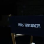 Chris Hemsworth's name on the back of a director's chair