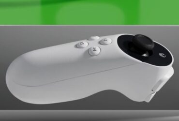 Xbox Adaptive Joystick controller with a gray and green background