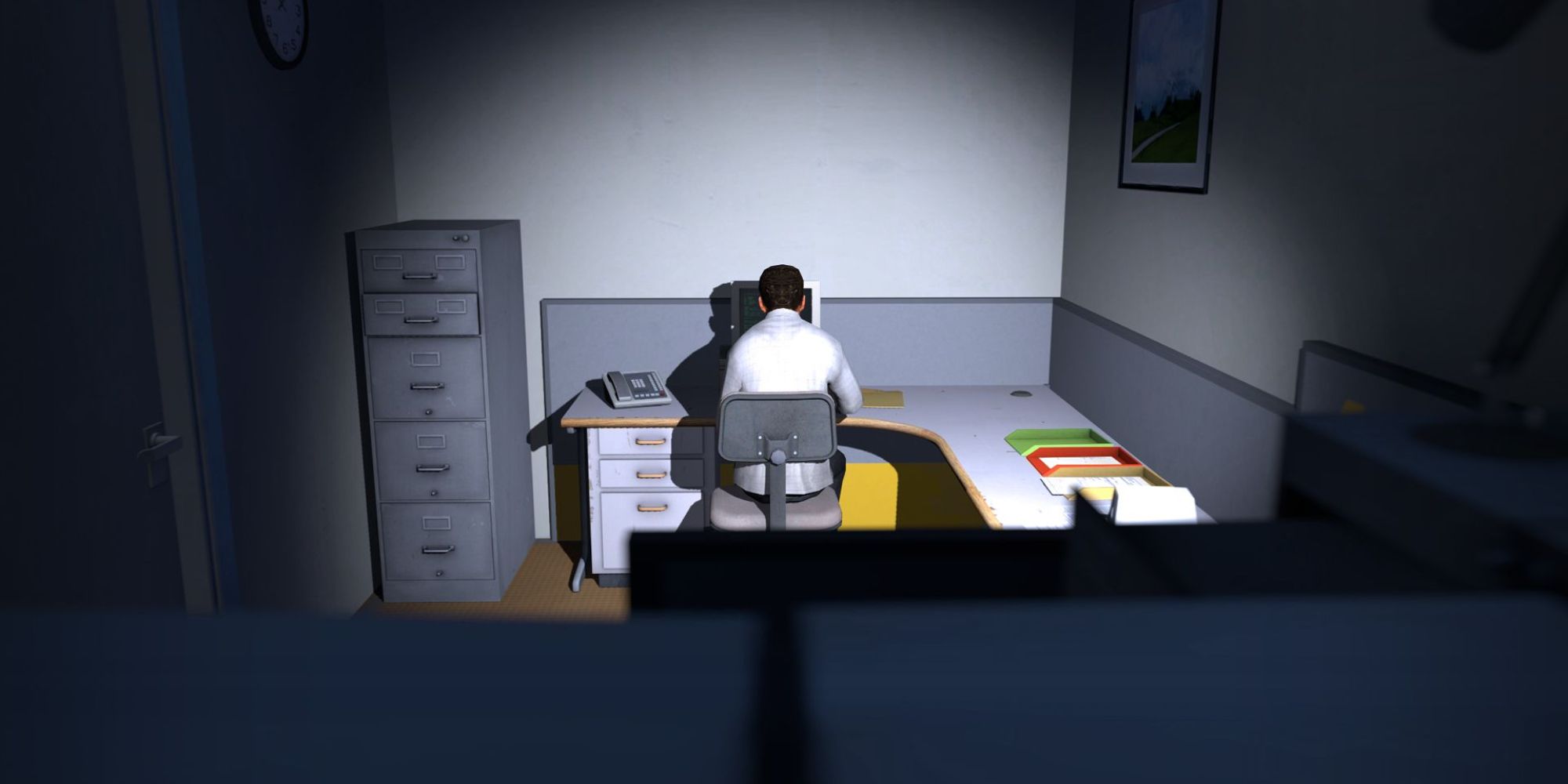 Stanley sat at his desk in The Stanley Parable.