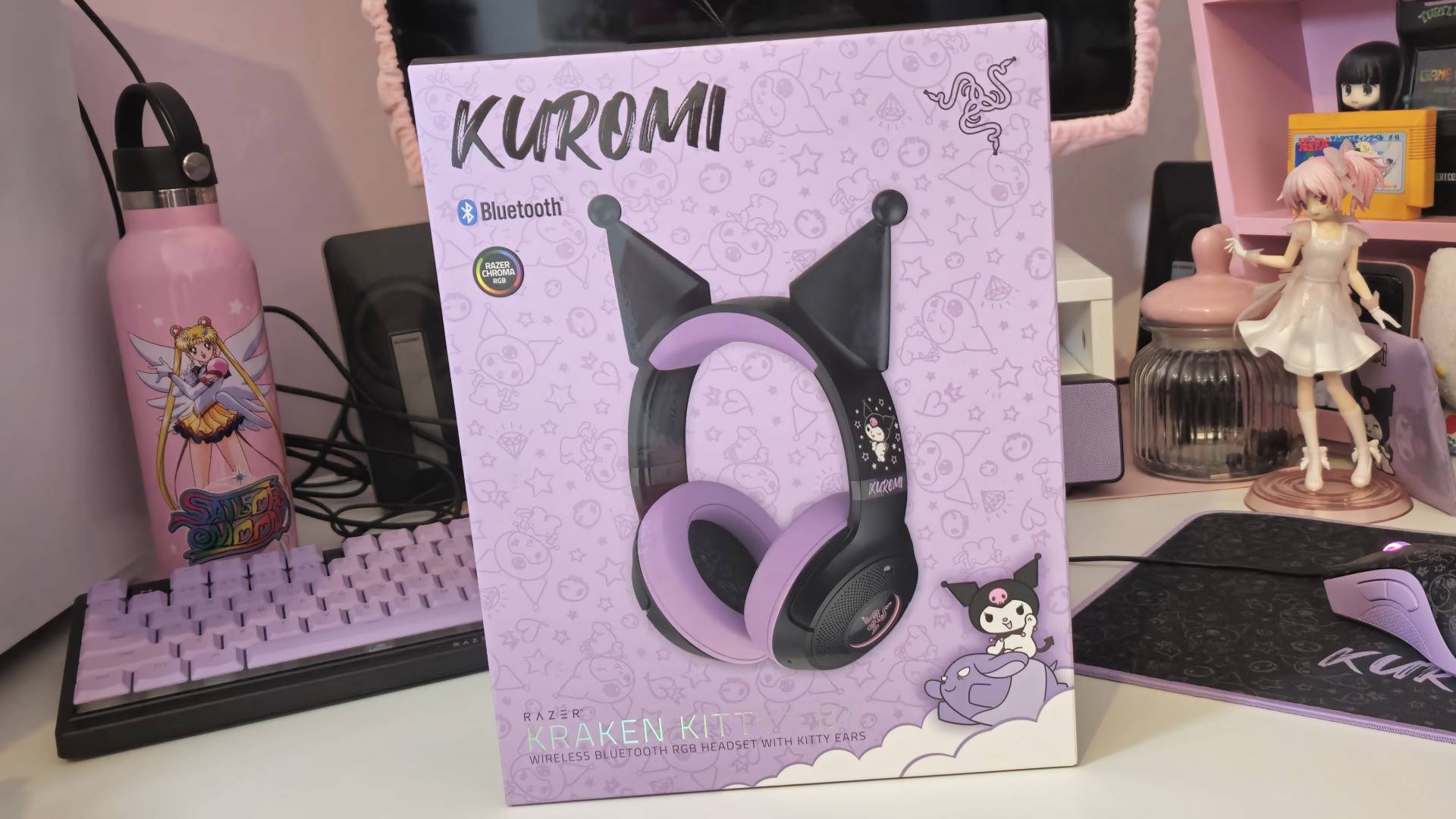 Photos taken by writer Rosalie Newcombe of the Razer Kraken Kitty V2 BT Kuromi Edition gaming headset, on a white desk. 