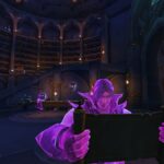 A purple scholar reads a text in a World of Warcraft library