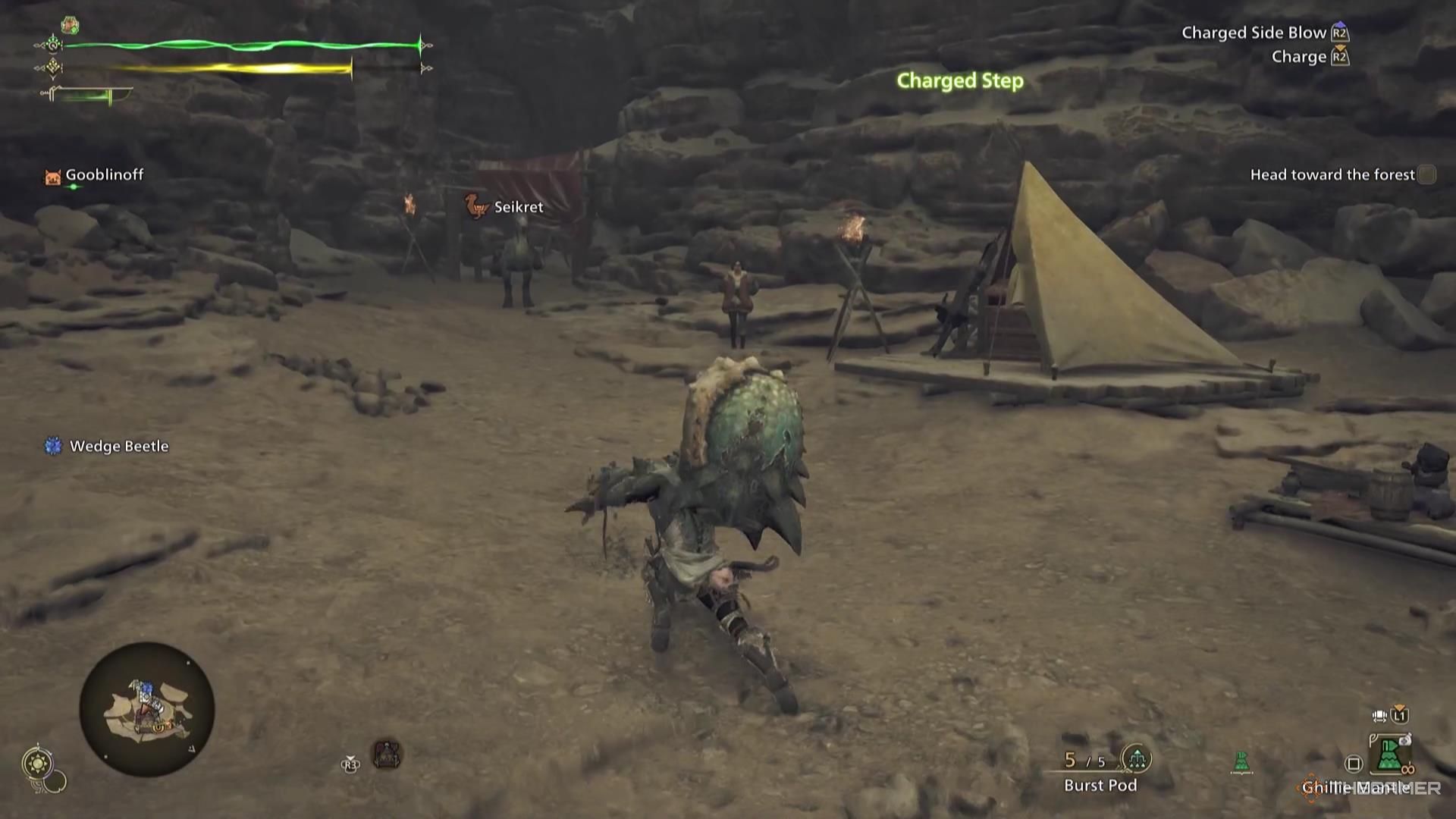 A Hunter lunges forward while charging their Hammer in Monster Hunter Wilds.