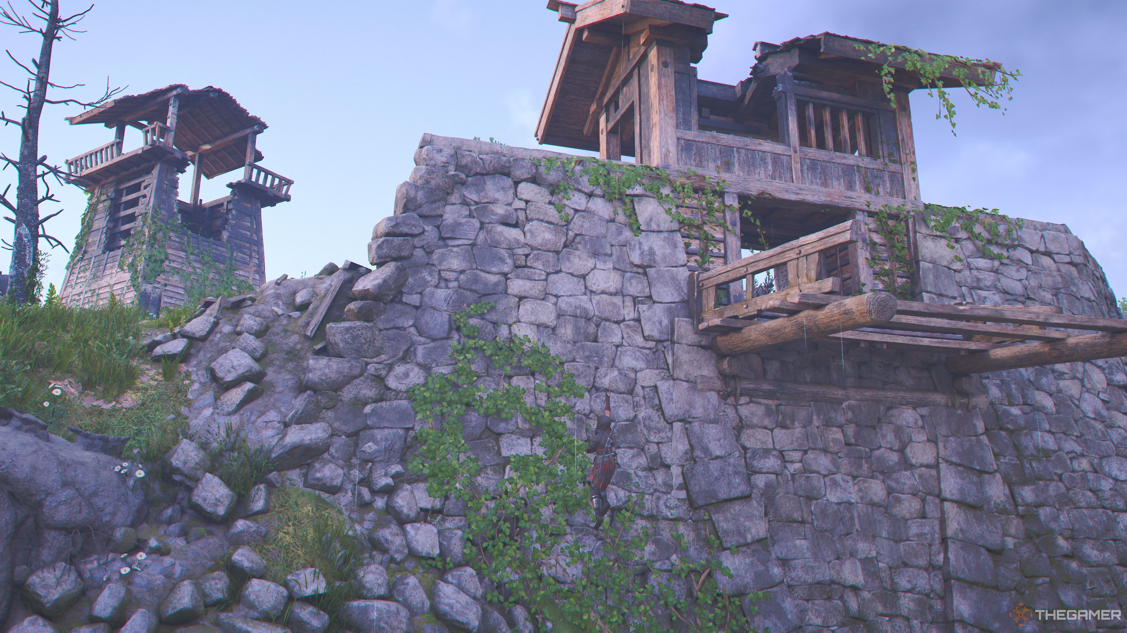 Noae scaling the Kashiwabara Fortress wall in Assassin's Creed Shadows.