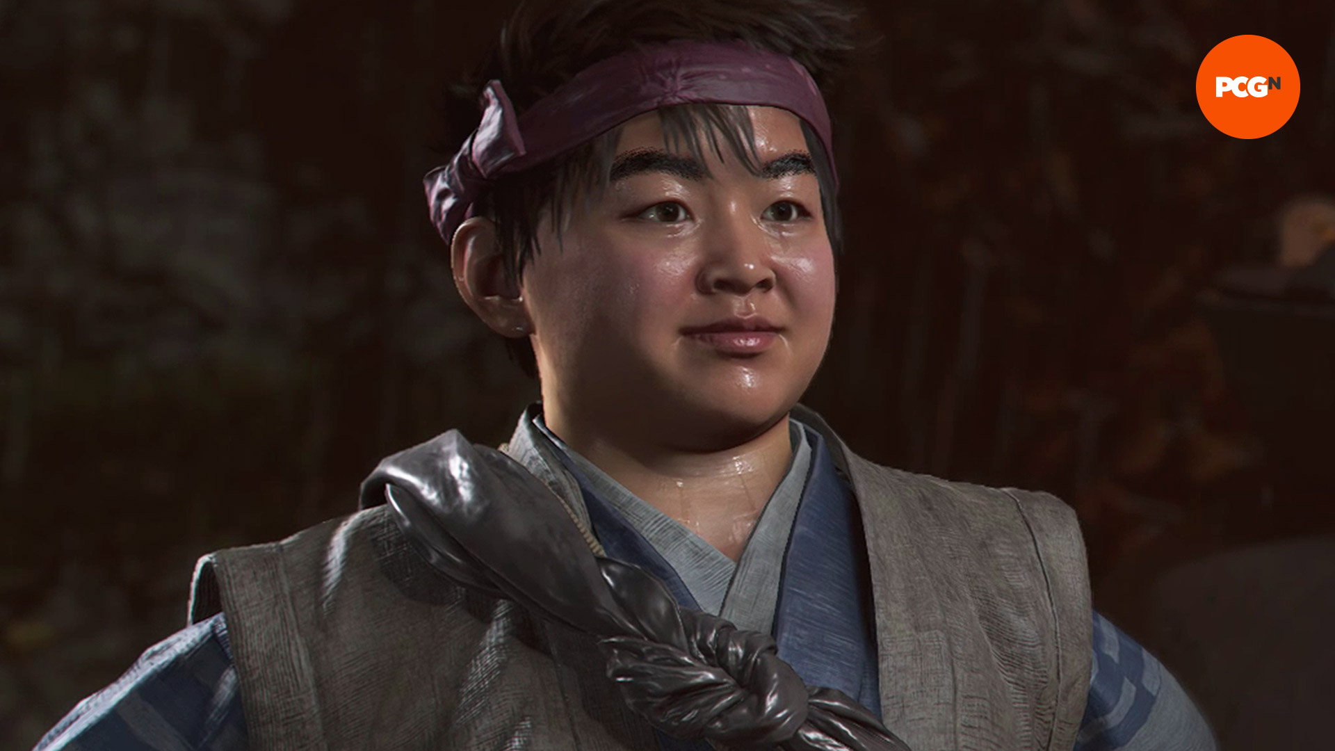 Assassin's Creed Shadows allies: Junjiro wearing a grey and blue outfit with a red bandana