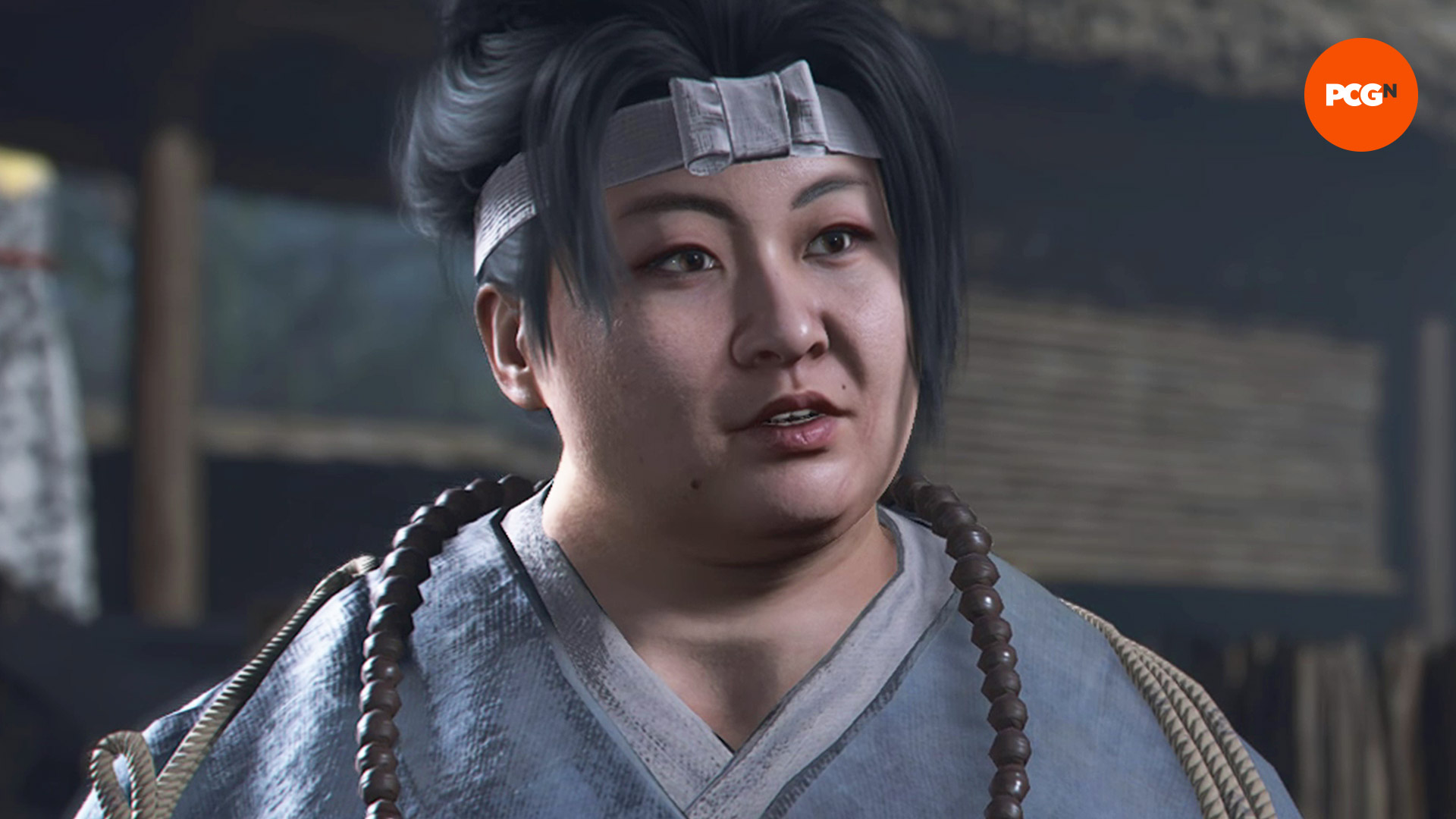 Assassin's Creed Shadows allies: Yaya wearing a grey outfit, rosary beads, and a headband