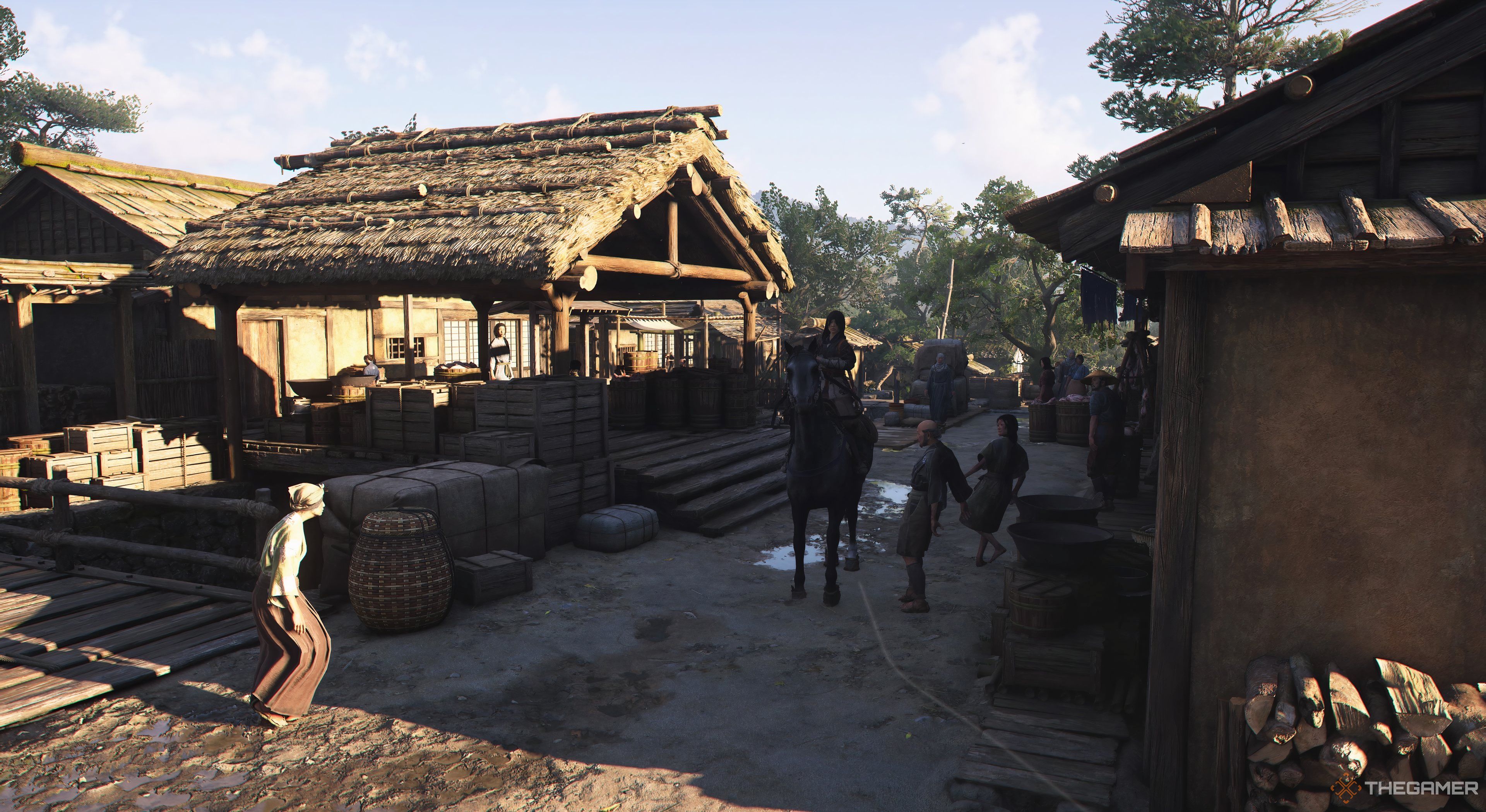 Assasssin's Creed Shadow Naoe riding here horse with citizens looking at her. There's a buildings around. 
