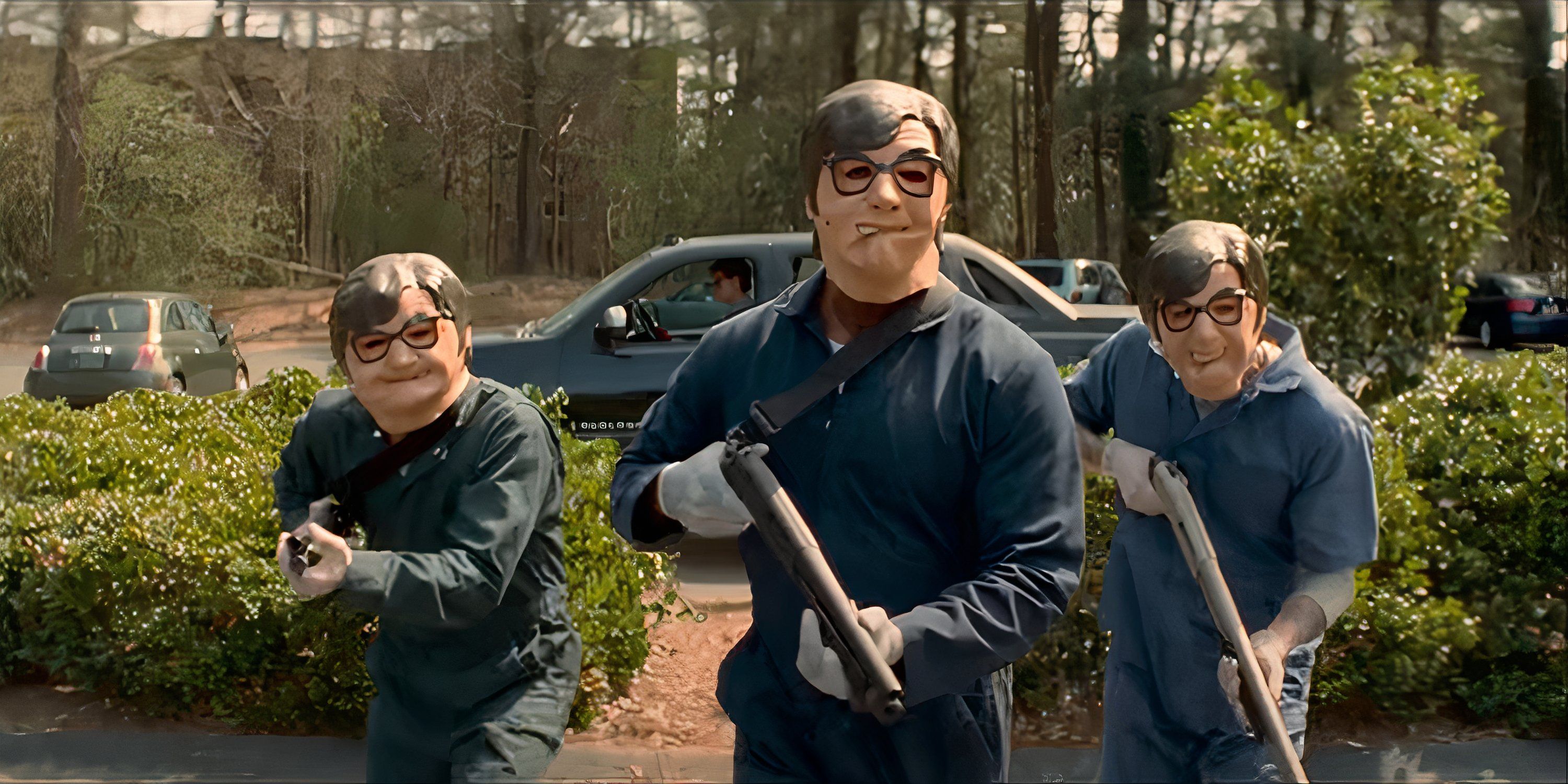 Baby Driver - Three robbers wielding shotguns and dressed in Michael Myers jumpsuits but with actor Mike Myers's face as their mask, while Baby is seen in the getaway truck behind them.