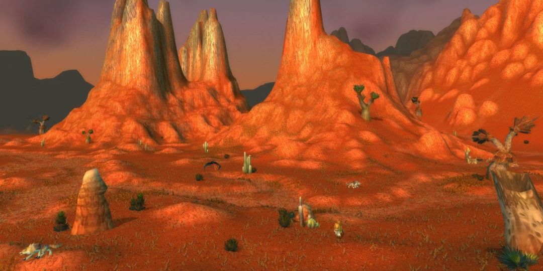 The Badlands, a desert zone filled with red dirt and cacti, is shown.