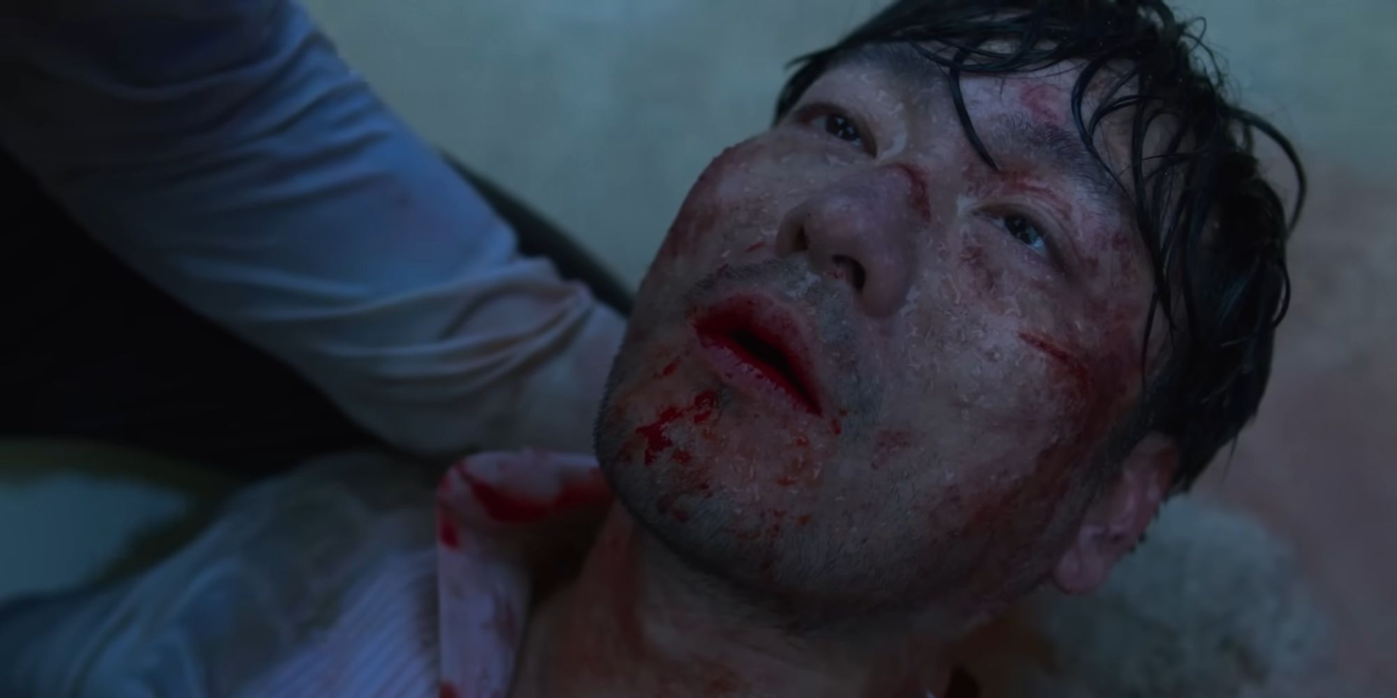 Cho Sang-woo dies in Gi-hun's arms.