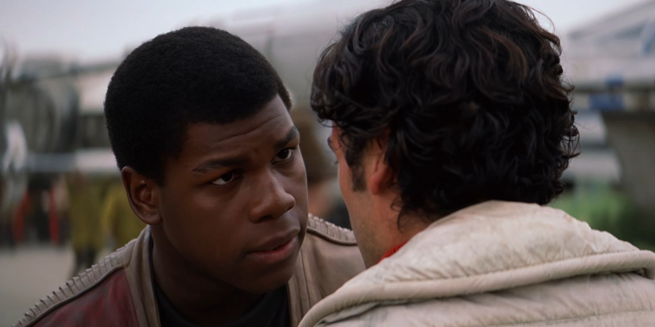 Finn talking to Poe Dameron in Star Wars: Episode 7 - The Force Awakens.