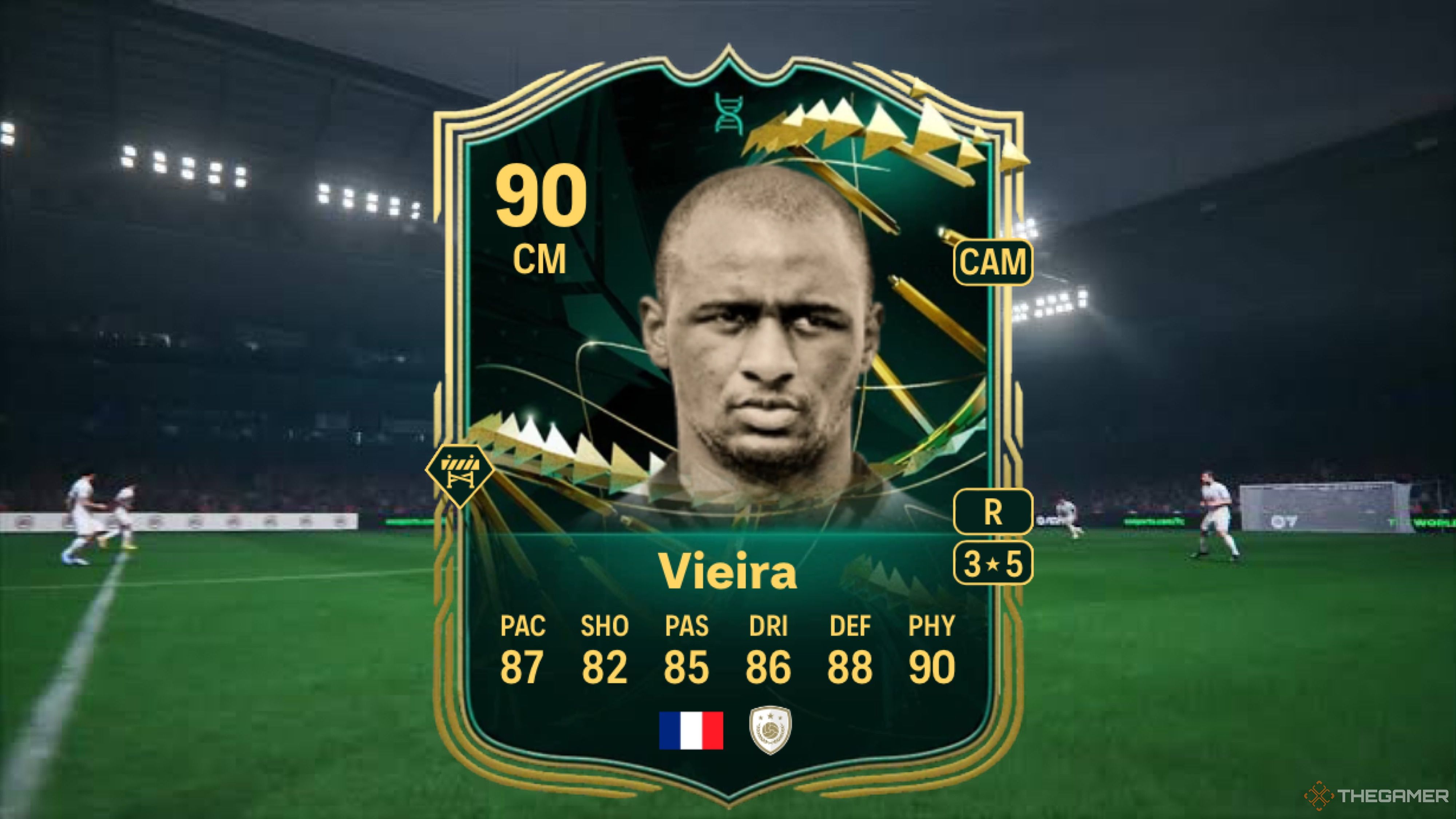 Image showing Vieira card against a faded pitch background.