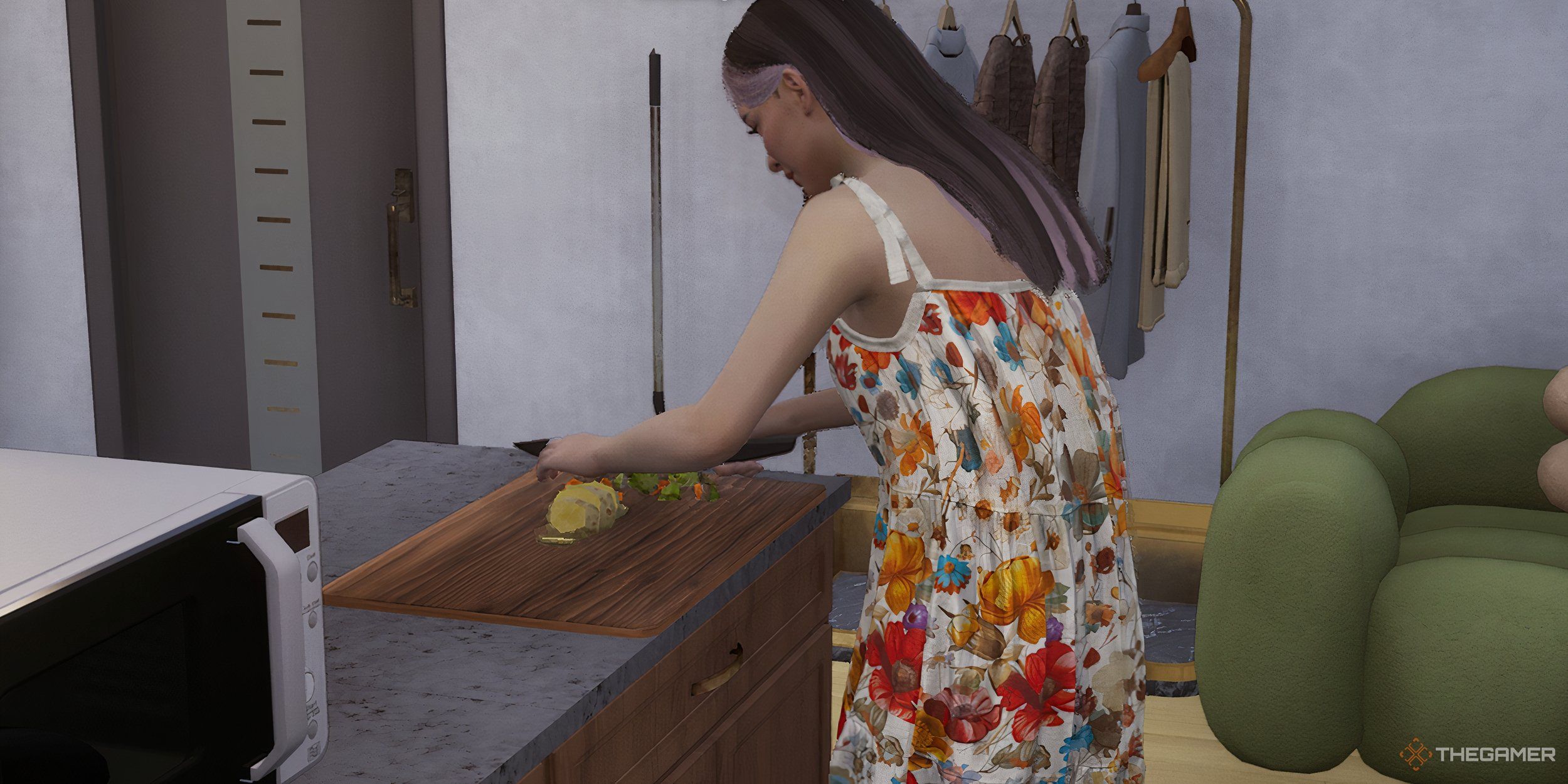 A woman chopping vegetables in her kitchen.