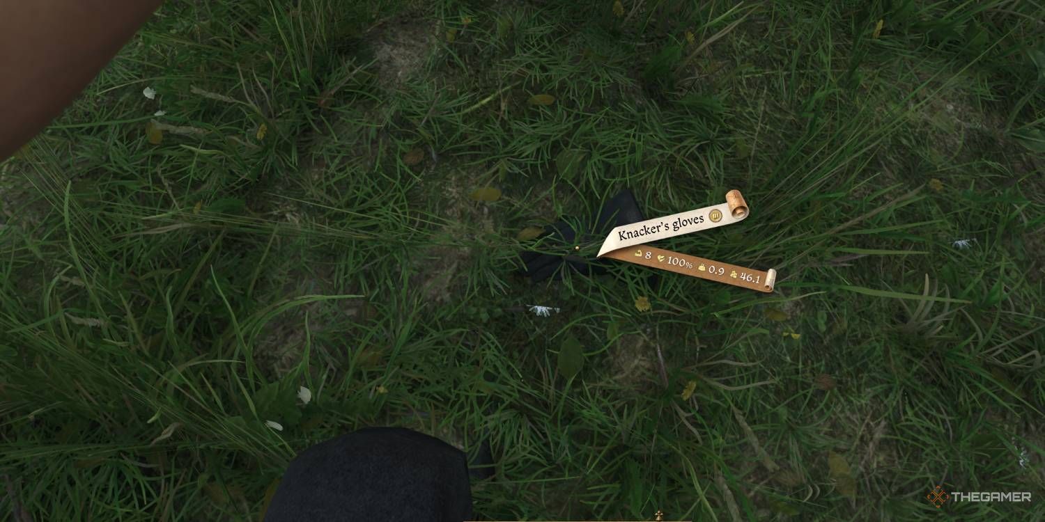 Knacker's Gloves displayed in a field in Kingdom Come Deliverance 2.