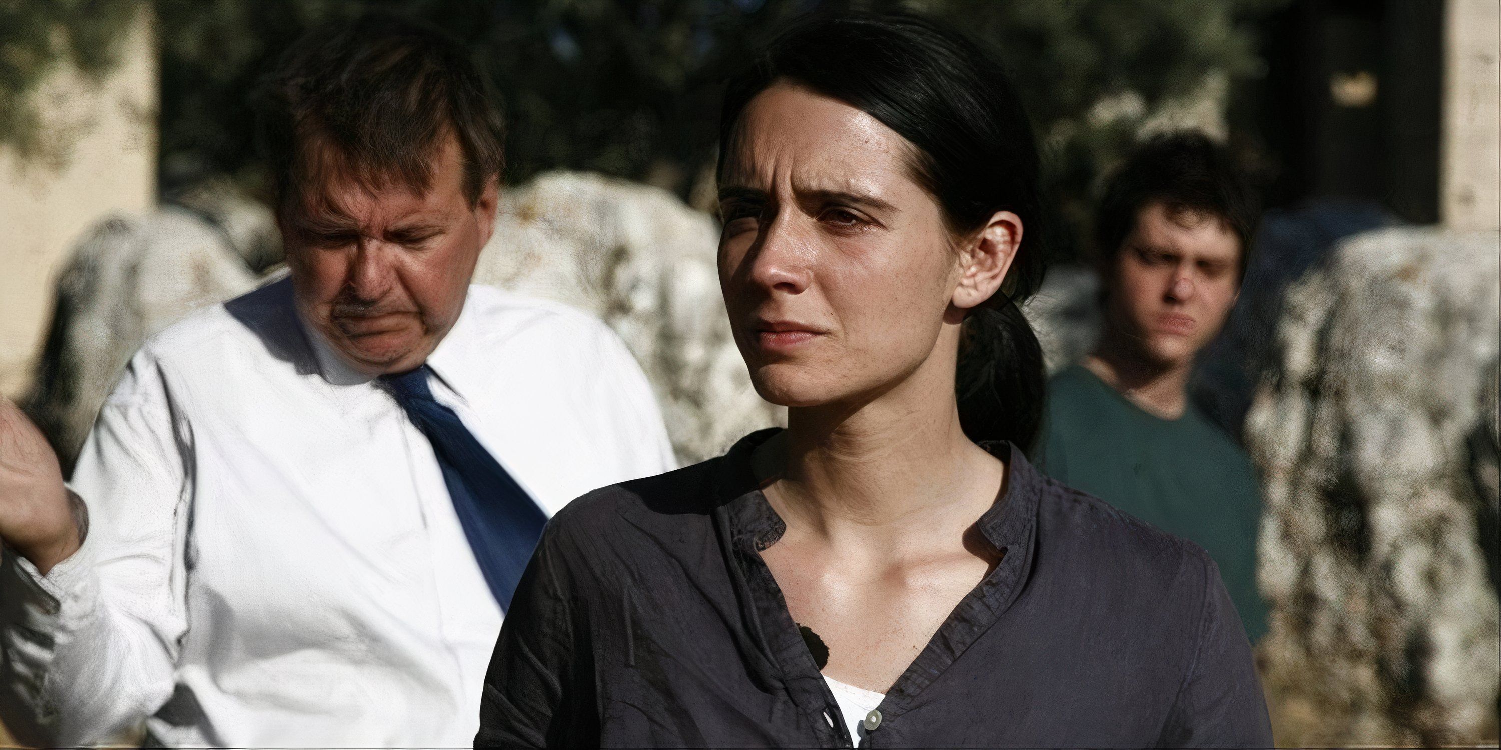 Mélissa Désormeaux-Poulin and Rémy Girard walking together in a scene in Incendies.