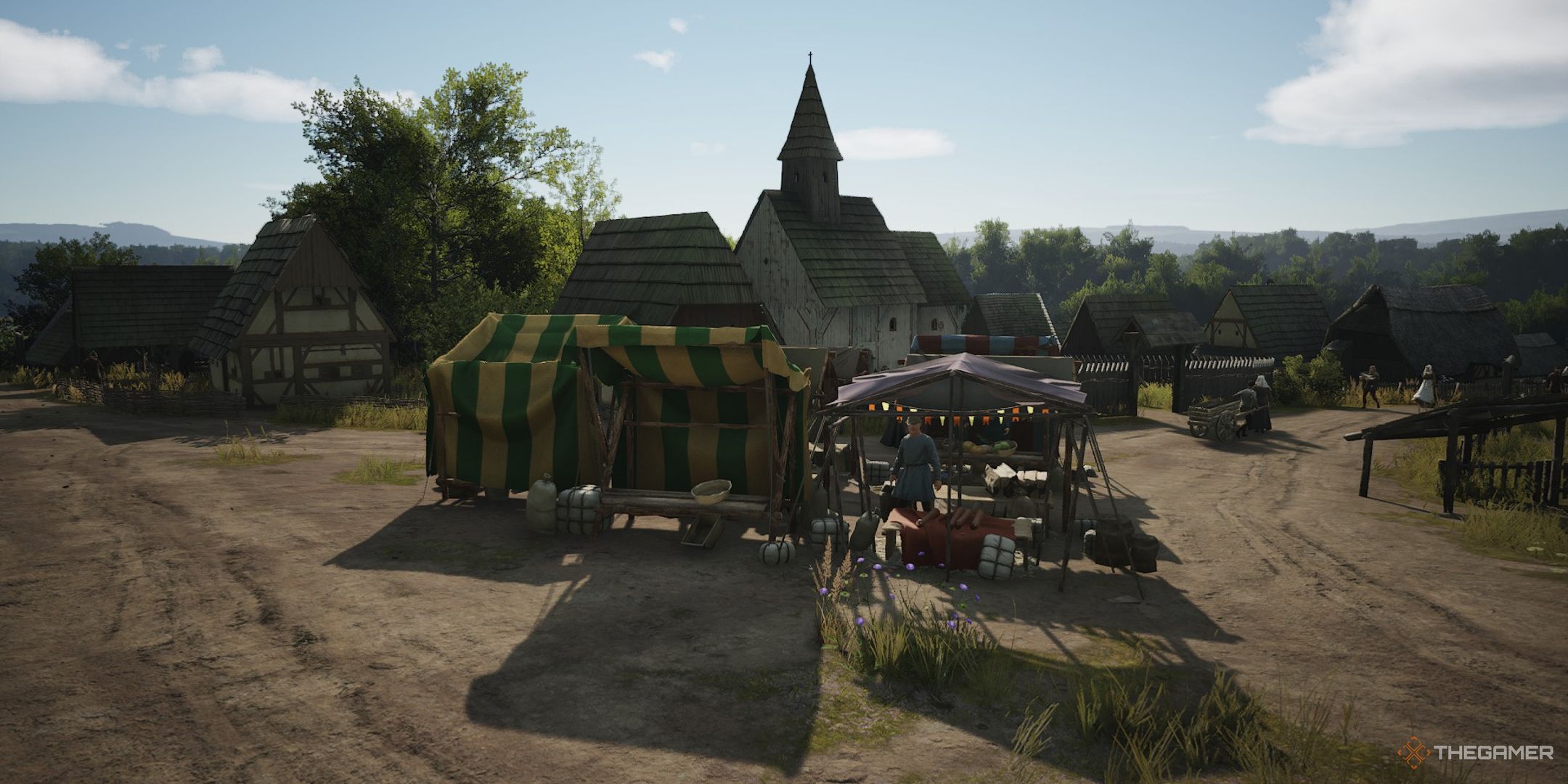 manor lords marketplace with church in background