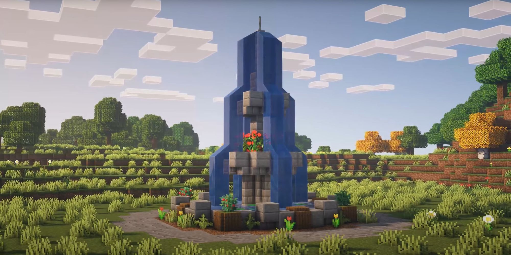 An image from Minecraft of a large fountian that can be placed at the center of a village to mark a gathering spot.