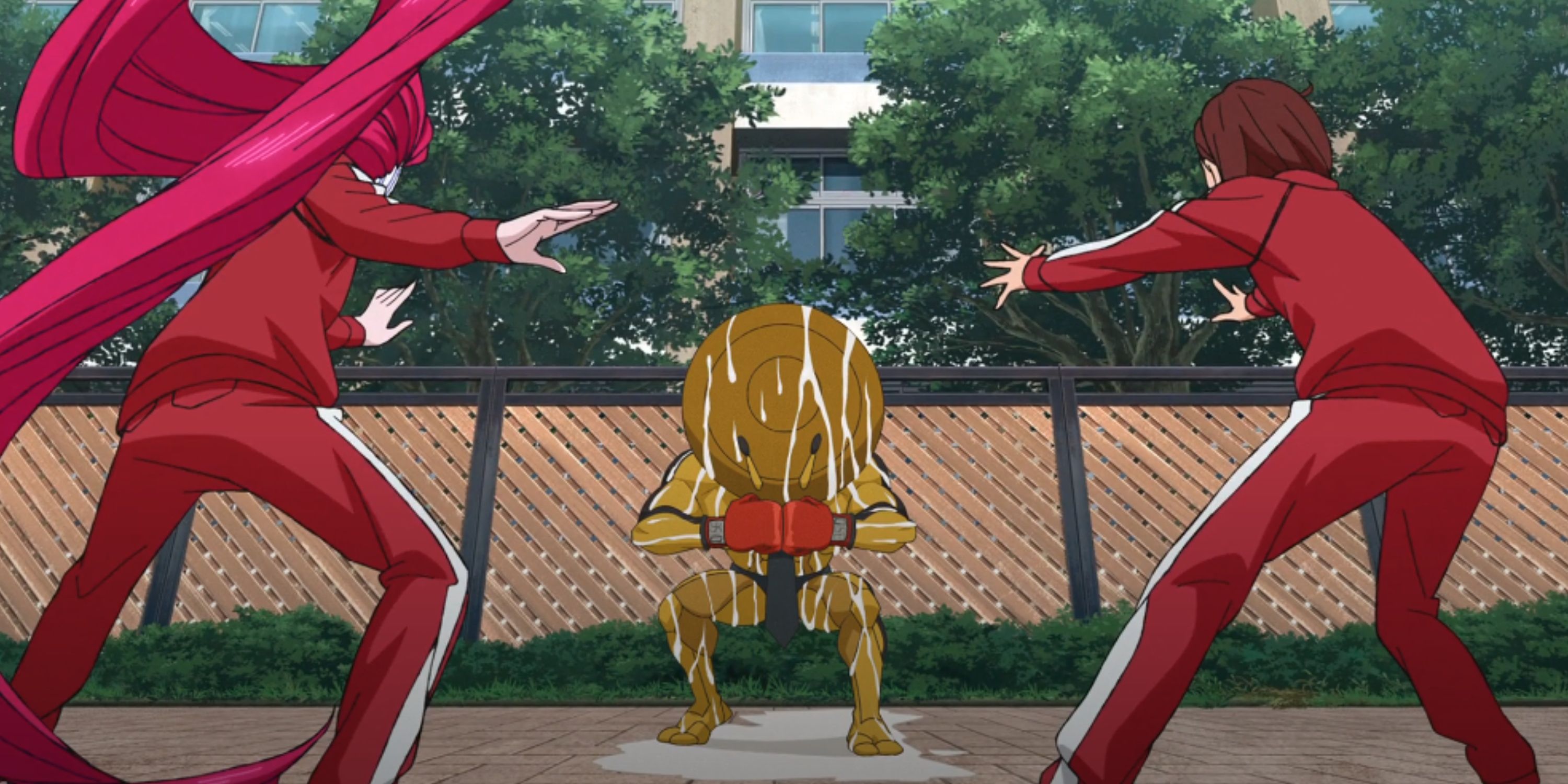 A bleeding Dover Demon challenges Momo and Aira in Dandadan.