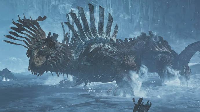 A big ice-based monster, Jin Dahaad, formed of ridges and metal-like armor, in an ice level in Monster Hunter Wilds.